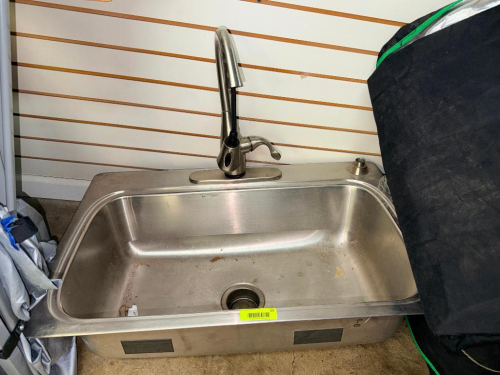 DROP IN STAINLESS KITCHEN SINK W/ SPRAYER FAUCET.