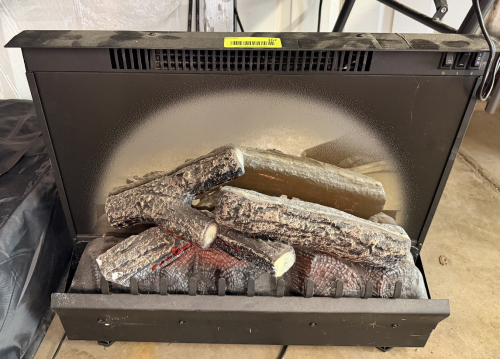 DIMPLEX ELECTRIC FIREPLACE INSERT WITH REALISTIC LOG SET AND FLAME EFFECT. FREESTANDING UNIT.
