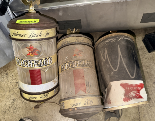 (3) VINTAGE ANHEUSER-BUSCH MICHELOB LIGHTED BEER SIGNS. INCLUDES (2) MICHELOB CYLINDER LIGHTS AND (1) MILLER HIGH LIFE CYLINDER LIGHT.