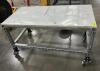(1) ROLLING METAL FRAME TABLE