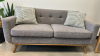 (1) GRAY COUCH WITH (2) WHITE AND GRAY PILLOWS - 2
