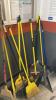 (1) LOT OF ASSORTED BROOMS AND DUST PANS