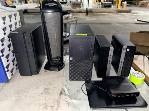 (4) COMPUTER TOWERS AND (1) HEATER.