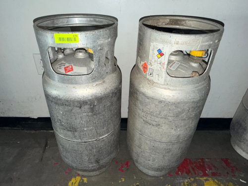 (2) EMPTY PROPANE TANKS ( EMPTY )