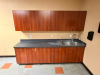 MODULAR BREAKROOM CABINETRY SET WITH LAMINATE COUNTERTOP, DOUBLE-BASIN STAINLESS STEEL SINK, GOOSENECK FAUCET, UPPER WALL CABINETS, BASE CABINETS, DRAWERS, AND INTEGRATED BACKSPLASH - 3