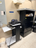 ROLL ABOUT COMPUTER DESK AND FOUR DRAWER LATERAL CABINET.