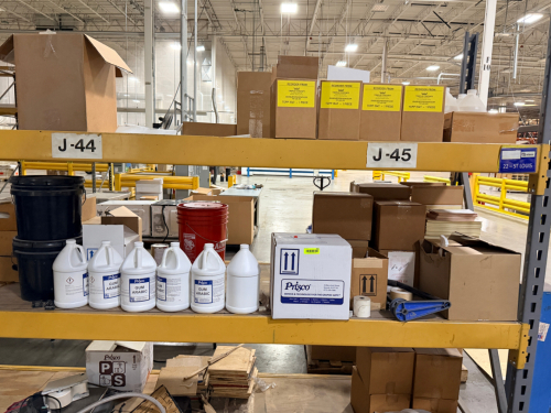 CONTENTS OF RACKING - LARGE ASSORTMENT OF CLEANING SUPPLIES AND LABELS.