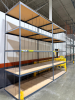 (2) SECTIONS OF 8' X 4' FIVE TIER METAL SHELVING W/ COMPOSITE WOOD INSERT SHELVES.