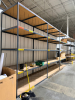 (3) SECTIONS OF 8' X 4' FIVE TIER METAL SHELVING W/ COMPOSITE WOOD INSERT SHELVES.