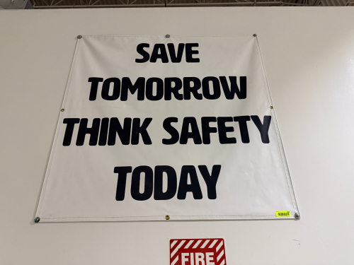 40" X 40" VINYL SAFETY BANNER.