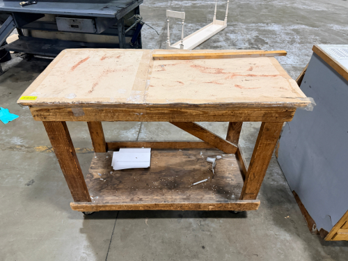 60" WOODEN FABRICATION TABLE.