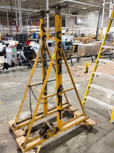 PAIR OF HEAVY-DUTY ADJUSTABLE ROLLING STEEL PIPE JACK STANDS WITH V-GROOVE ROLLERS.