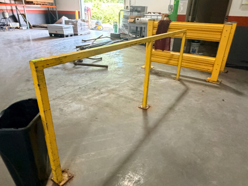 10' SECTION OF METAL RAILING AND (1) 48" SECTION OF SAFETY GUARD RAIL.