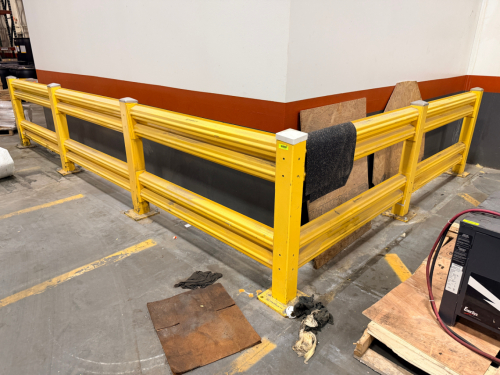 (5) SECTIONS OF HEAVY-DUTY STEEL WAREHOUSE SAFETY GUARD RAIL BARRIER SYSTEM WITH FLOOR-MOUNT POSTS, TRIPLE HORIZONTAL RAILS. YELLOW POWDER-COATED FINISH.