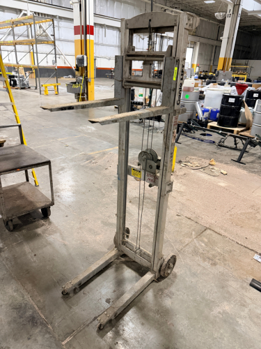 MANUAL MATERIAL LIFT WITH WINCH-OPERATED LIFTING MECHANISM, ADJUSTABLE FORKS, AND 350 LB. MAXIMUM CAPACITY