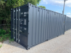 20' NEW ONE-TRIP ISO SHIPPING CONTAINER WITH DOUBLE SWING DOORS. STEEL CONSTRUCTION WITH LOCKING CAM BARS, FORKLIFT POCKETS, CORNER CASTINGS, AND CSC CERTIFICATION PLATE. FINISHED IN DARK GRAY. - 2