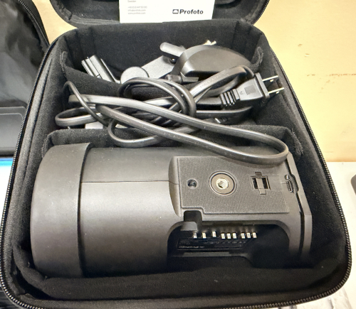 (3) PORTABLE BATTERY-POWERED OFF-CAMERA FLASH MONOLIGHT WITH CARRYING CASE, AC CHARGER, AND DOCUMENTATION. INTEGRATED AIRTTL RADIO SYSTEM.