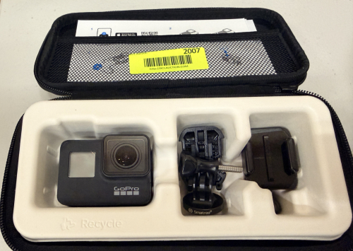 GOPRO ACTION CAMERA WITH BATTERY, CHARGER, MOUNTING ACCESSORIES, AND HARD CARRYING CASE