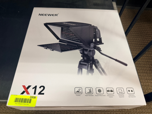 NEEWER X12 TELEPROMPTER KIT IN ORIGINAL BOX. DESIGNED FOR DSLR, MIRRORLESS, CINEMA CAMERAS, SMARTPHONES, AND TABLETS.