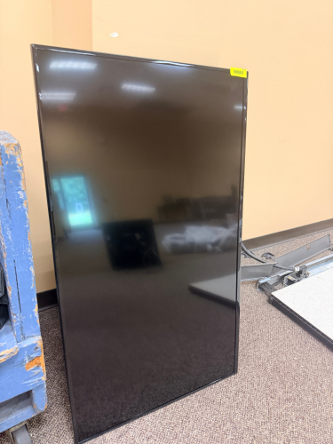 50" CLASS FIRE TV SMART LED TELEVISION WITH WALL MOUNT AND REMOTE.