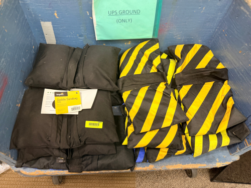 LOT OF (16) FILLED SADDLE SANDBAGS.