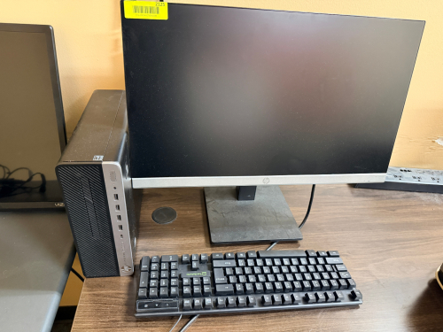 HP PRODESK SMALL FORM FACTOR DESKTOP COMPUTER WITH HP MONITOR, KEYBOARD, AND MOUSE.