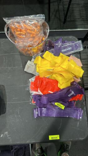 (1) LOT OF FITNESS BANDS AND EAR PLUGS