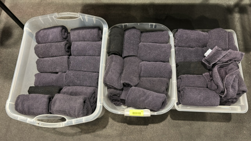 (3) BINS OF TOWELS
