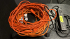 (2) EXTENSION CORDS AND (1) SURGE PROTECTOR