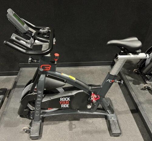 (1) SCHWINN AC PERFORMANCE PLUS INDOOR CYCLE WITH 2 WEIGHTED BARS