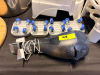 (1) DUST BUSTER AND (4) SMALL EQUIPMENT MOVERS