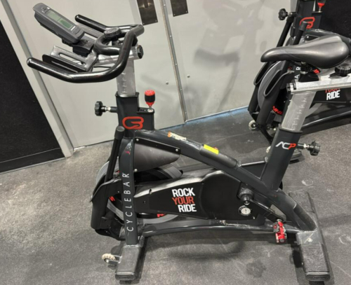 (1) SCHWINN AC PERFORMANCE PLUS INDOOR CYCLE WITH 2 WEIGHTED BARS