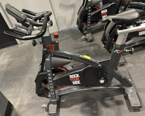 (1) SCHWINN AC PERFORMANCE PLUS INDOOR CYCLE WITH 2 WEIGHTED BARS, MISSING PEDALS