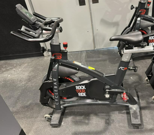 (1) SCHWINN AC PERFORMANCE PLUS INDOOR CYCLE WITH 2 WEIGHTED BARS