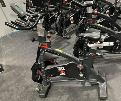 (1) SCHWINN AC PERFORMANCE PLUS INDOOR CYCLE WITH 2 WEIGHTED BARS