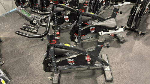 (1) SCHWINN AC PERFORMANCE PLUS INDOOR CYCLE WITH 2 WEIGHTED BARS