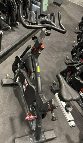 (1) SCHWINN AC PERFORMANCE PLUS INDOOR CYCLE WITH 2 WEIGHTED BARS