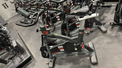 (1) SCHWINN AC PERFORMANCE PLUS INDOOR CYCLE WITH 2 WEIGHTED BARS