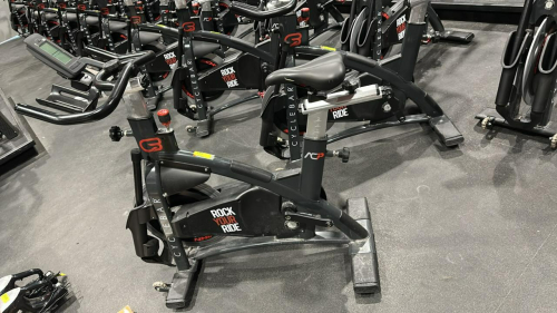 (1) SCHWINN AC PERFORMANCE PLUS INDOOR CYCLE WITH 2 WEIGHTED BARS, MISSING PEDALS