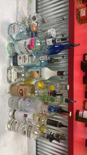 (1) ASSORTED LOT OF OPENED LIQUOR BOTTLES WITH POUR SPOUTS