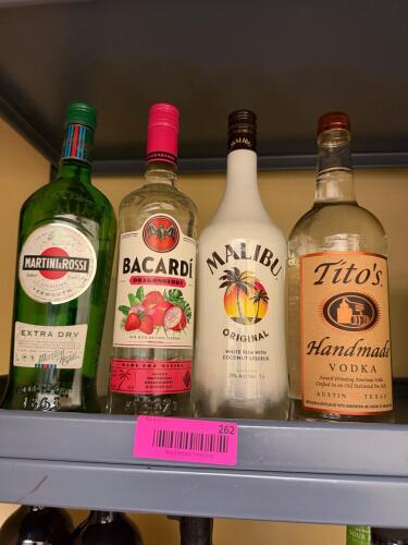 (4) ASSORTED BOTTLES OF TITO'S, MALIBU, BACARDI & MARTINI & ROSSI