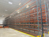 (17) SECTIONS OF 25 FT TALL UPRIGHTS, 42 IN DEEP, AND 8 FT LONG CROSS BEAMS OF TEAR DROP PALLET RACKING WITH WIRE DECKING. INCLUDES (18) UPRIGHTS, ORANGE STEP BEAMS, GREEN UPRIGHTS, WIRE DECKS, END CAP CHAIN LINK SAFETY CAGES WITH ACCESS GATE, AND CARGO N - 3