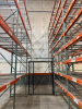 (17) SECTIONS OF 25 FT TALL UPRIGHTS, 42 IN DEEP, AND 8 FT LONG CROSS BEAMS OF TEAR DROP PALLET RACKING WITH WIRE DECKING. INCLUDES (18) UPRIGHTS, ORANGE STEP BEAMS, GREEN UPRIGHTS, WIRE DECKS, END CAP CHAIN LINK SAFETY CAGES WITH ACCESS GATE, AND CARGO N - 4