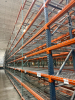 (34) SECTIONS OF 25 FT TALL UPRIGHTS AND 8 FT LONG CROSS BEAMS OF TEAR DROP PALLET RACKING. CONFIGURED AS (2) BACK-TO-BACK RUNS OF (17) SECTIONS EACH. INCLUDES (36) UPRIGHTS, ORANGE STEP BEAMS, GREEN UPRIGHTS, HEAVY-DUTY WIRE DECKING, AND STABILIZING TIE - 8
