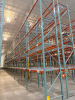 (34) SECTIONS OF 25 FT TALL UPRIGHTS AND 8 FT LONG CROSS BEAMS OF TEAR DROP PALLET RACKING. CONFIGURED AS (2) BACK-TO-BACK RUNS OF (17) SECTIONS EACH. INCLUDES (36) UPRIGHTS, ORANGE STEP BEAMS, GREEN UPRIGHTS, HEAVY-DUTY WIRE DECKING, AND STABILIZING TIE - 6