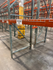 (34) SECTIONS OF 25 FT TALL UPRIGHTS AND 8 FT LONG CROSS BEAMS OF TEAR DROP PALLET RACKING. CONFIGURED AS (2) BACK-TO-BACK RUNS OF (17) SECTIONS EACH. INCLUDES (36) UPRIGHTS, ORANGE STEP BEAMS, GREEN UPRIGHTS, HEAVY-DUTY WIRE DECKING, AND STABILIZING TIE - 8