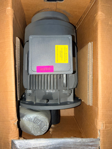 HEAVY-DUTY FLANGE-MOUNTED THREE-PHASE AC INDUCTION MOTOR. CAST IRON TEFC CONSTRUCTION WITH TOP-MOUNTED TERMINAL BOX.