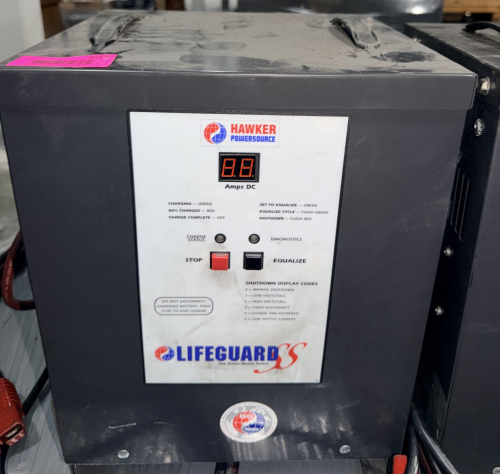 INDUSTRIAL SMART BATTERY CHARGER WITH DIGITAL DISPLAY, PUSH-BUTTON CONTROLS, AND STEEL FLOOR-MOUNT CABINET.