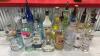 (1) ASSORTED LOT OF OPENED LIQUOR BOTTLES WITH POUR SPOUTS - 8