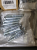 (1) TABLE OF MISC NUTS AND BOLTS - 4